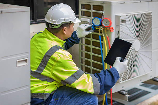Professional Air Duct Cleaning technician working in Northport, WA